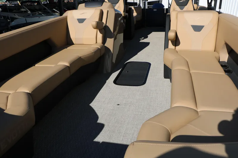 Slide: The Image of Luxurious interior of 2026 Evotti 525 QL Tri-Toon with beige seating and modern design. - 14