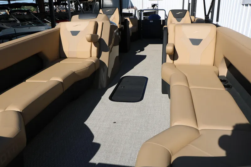 Slide: The Image of Luxurious interior of 2026 Evotti 525 QL Tri-Toon boat with beige seating. - 15