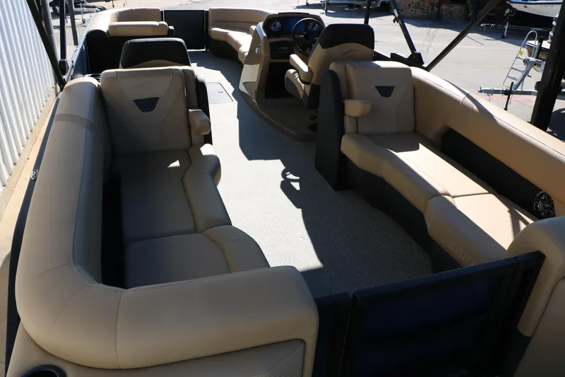 Slide: The Image of 2026 Evotti 525 QL Tri-Toon boat interior with luxurious seating and modern design. - 19