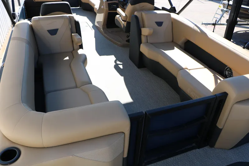 Slide: The Image of Luxurious interior of 2026 Evotti 525 QL Tri-Toon with beige seating and spacious layout. - 20
