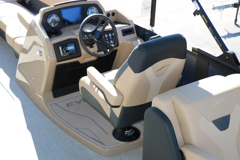 Slide: The Image of 2026 Evotti 525 QL Tri-Toon boat interior with steering console and seating. - 25