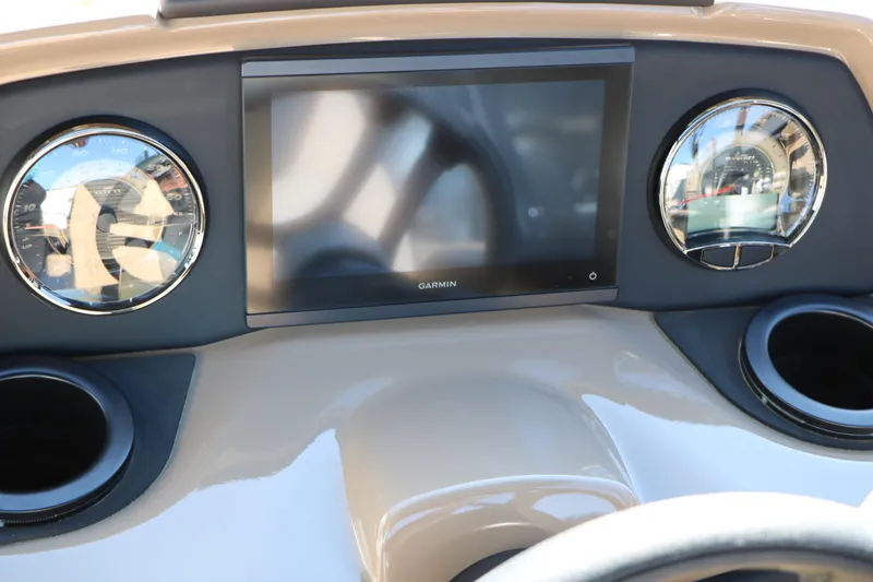 Slide: The Image of Dashboard of 2026 Evotti 525 QL Tri-Toon with Garmin display and gauges. - 31