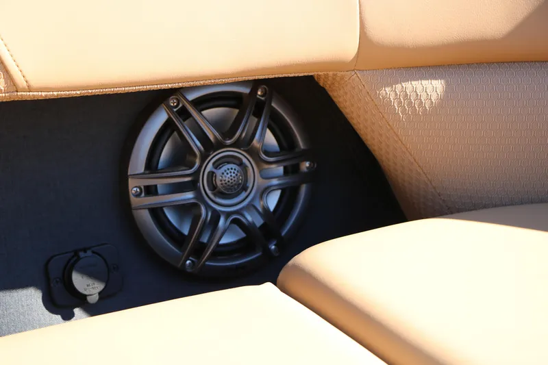 Slide: The Image of Speaker and seating detail in 2026 Evotti 525 QL Tri-Toon boat. - 38