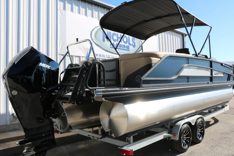 Slide: The Image of 2026 Evotti 525 QL Tri-Toon boat with Mercury engine on trailer at Nichols Marine. - 5