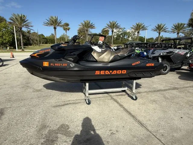 The Image of 2021 Sea-Doo GTX 230 jet ski with sound system, parked outdoors. - 1