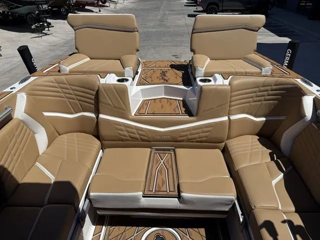 Slide: The Image of Luxurious interior of 2025 Tigé 25ZX with beige leather seating. - 10