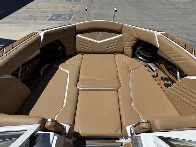 Slide: The Image of Luxurious interior of the 2025 Tigé 25ZX boat. - 12