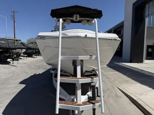 Slide: The Image of Front view of 2025 Tigé 25ZX boat on a trailer. - 4