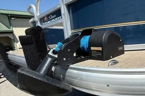 Slide: The Image of 2024 Sun Tracker Bass Buggy 16 XL pontoon boat with anchor winch and blue rope. - 10
