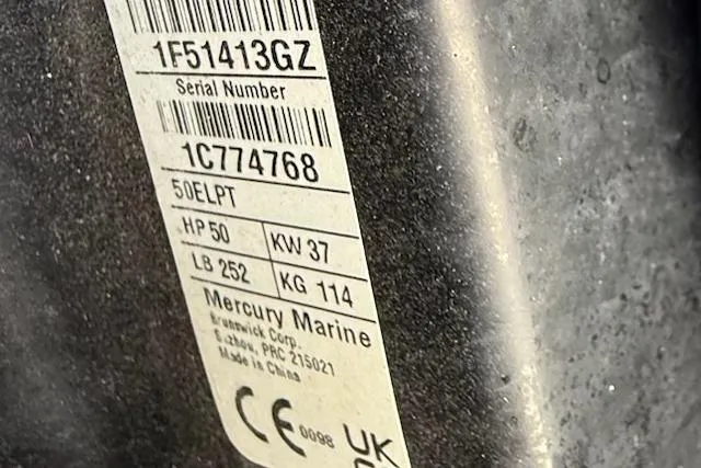 Slide: The Image of Label on Mercury Marine engine, showing serial number and specifications for Sun Tracker Bass Buggy 16 XL. - 13