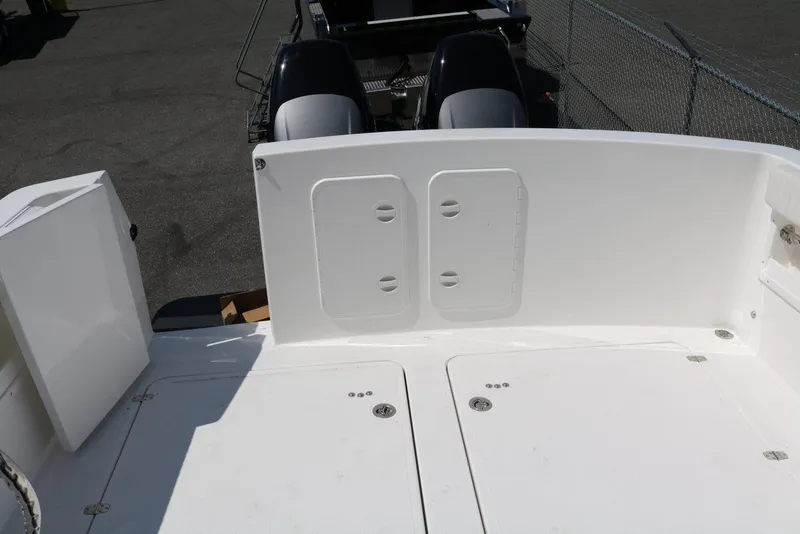 Slide: The Image of Sea Sport Voyager 3000 boat deck, 2026 model, featuring dual outboard motors. - 8