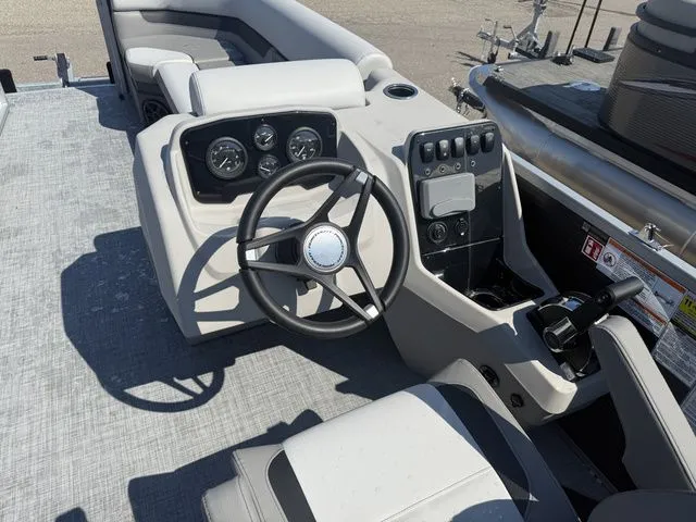 Slide: The Image of Interior view of 2026 Princecraft Vectra 23 QL boat with helm console. - 7