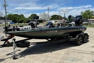 The Image of 2026 Blazer 595 Pro Elite boat on trailer in outdoor setting. - 1