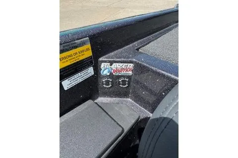 Slide: The Image of 2026 Blazer 595 Pro Elite boat interior with brand logo and capacity label. - 13