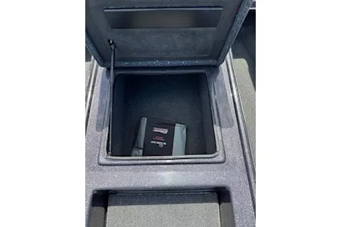 Slide: The Image of Open storage compartment in 2026 Blazer 595 Pro Elite boat. - 18