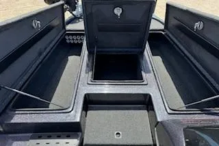Slide: The Image of 2026 Blazer 595 Pro Elite boat storage compartments open, showcasing spacious interior design. - 20