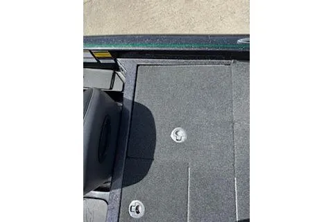 Slide: The Image of 2026 Blazer 595 Pro Elite boat deck with storage compartments. - 24