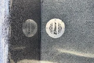 Slide: The Image of 2026 Blazer 595 Pro Elite boat interior with branded drain cover. - 27