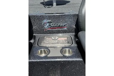 Slide: The Image of 2026 Blazer 595 Pro Elite boat interior with logo and cup holders. - 28