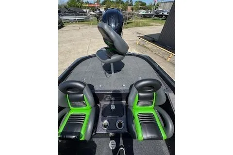 Slide: The Image of 2026 Blazer 595 Pro Elite boat interior with green and black seats. - 29