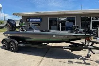 Slide: The Image of 2026 Blazer 595 Pro Elite boat on trailer outside dealership. - 5