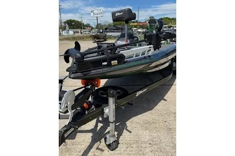 Slide: The Image of 2026 Blazer 595 Pro Elite boat on trailer, parked outdoors. - 7