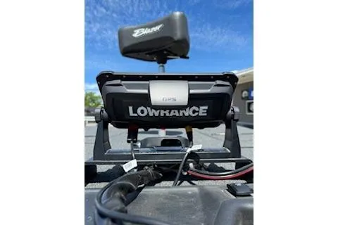 Slide: The Image of 2026 Blazer 595 Pro Elite with Lowrance GPS system under clear blue sky. - 8
