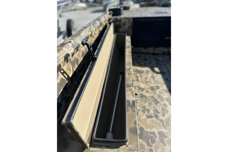 Slide: The Image of Camouflage interior of 2026 Excel 1751 Viper F4 boat, featuring storage compartment. - 10