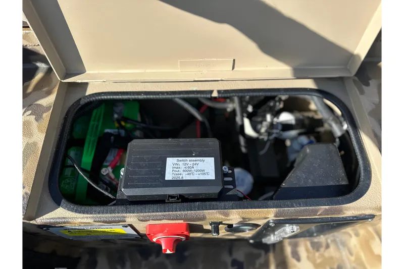 Slide: The Image of Open compartment of 2026 Excel 1751 Viper F4 showing electrical components and wiring. - 12