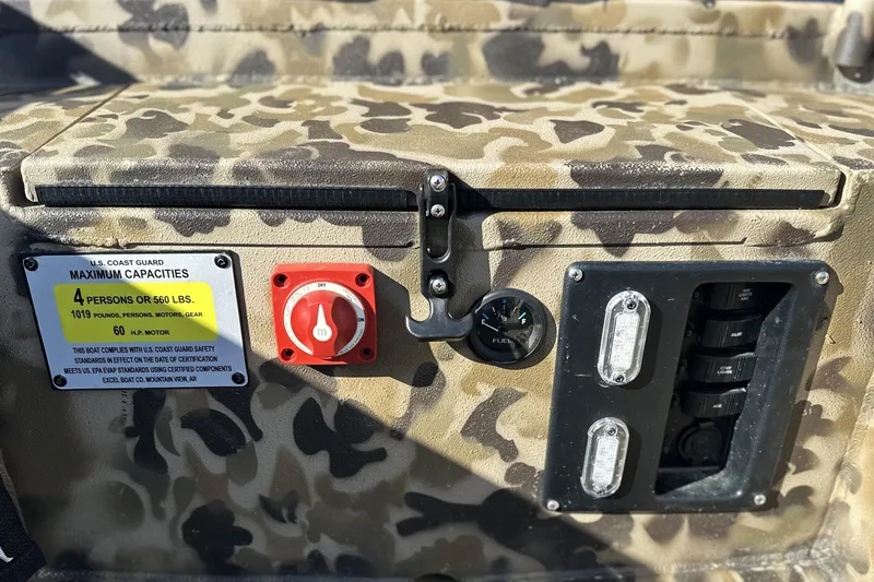 Slide: The Image of Camouflage dashboard of 2026 Excel 1751 Viper F4 boat with capacity and control panel. - 13