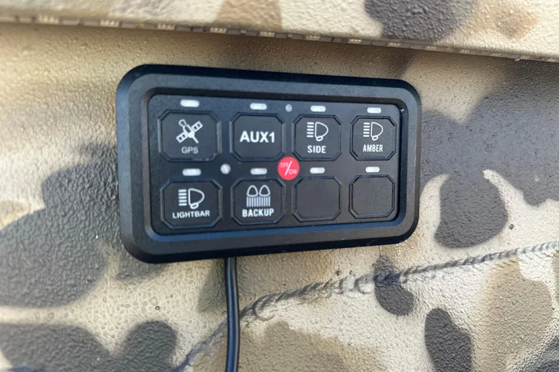 Slide: The Image of Control panel in Excel 1751 Viper F4, 2026 model, with camouflage background. - 14