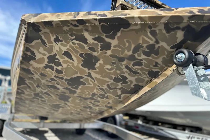 Slide: The Image of Camouflage-patterned hull of 2026 Excel 1751 Viper F4 boat on trailer. - 5