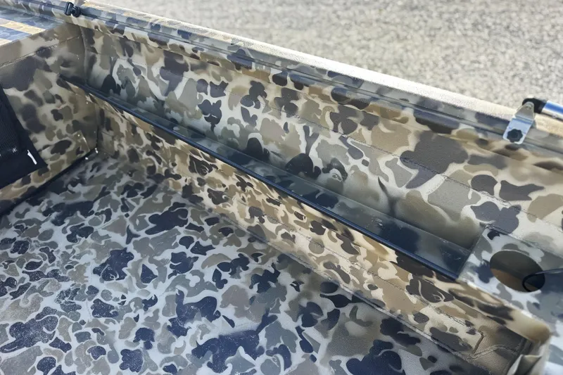 Slide: The Image of Camouflage interior of 2026 Excel 1751 Viper F4 boat, showcasing rugged design. - 7