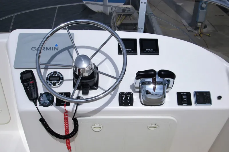 Slide: The Image of Control panel of 2026 Sea Sport Pacific 3200 boat with Garmin navigation system. - 12