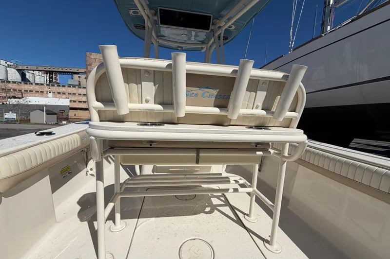 Slide: The Image of 2017 Sea Chaser 24 HFC boat interior with rod holders and seating. - 34