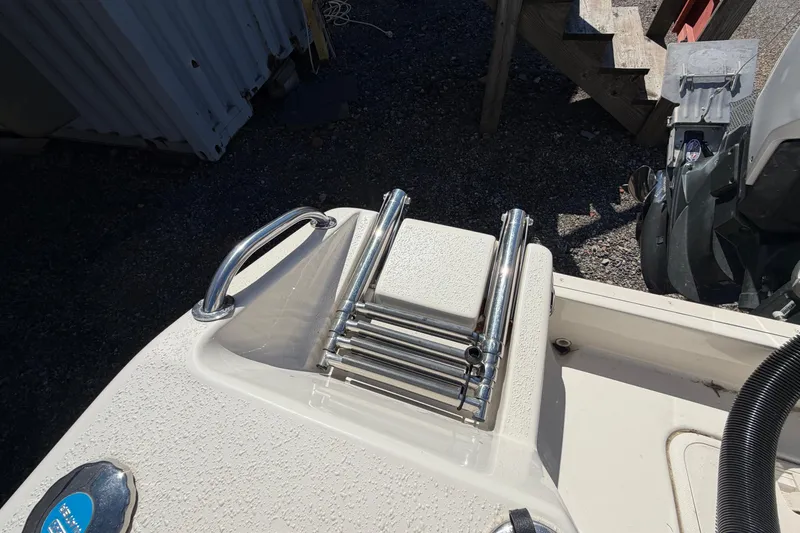 Slide: The Image of 2017 Sea Chaser 24 HFC boat ladder and handle on deck. - 36