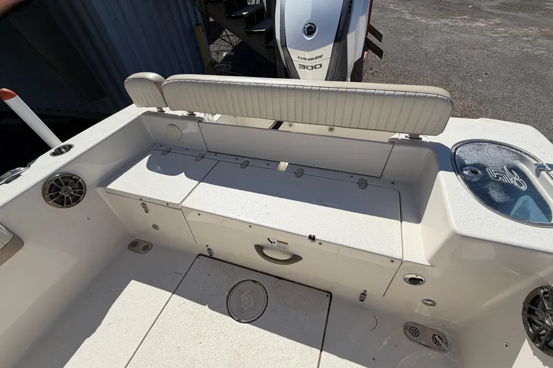 Slide: The Image of 2017 Sea Chaser 24 HFC boat interior with seating and storage compartments. - 41