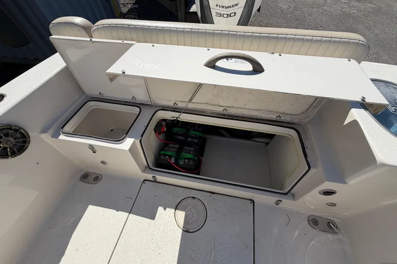 Slide: The Image of 2017 Sea Chaser 24 HFC boat interior with storage compartment and batteries. - 43