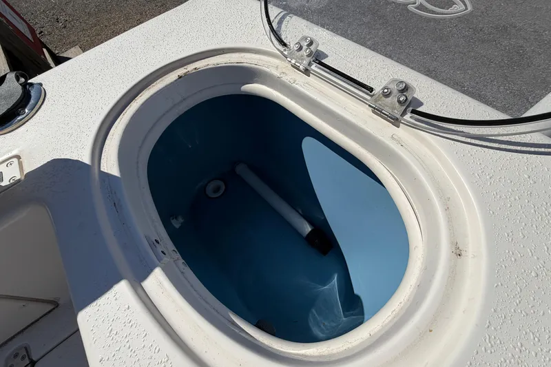 Slide: The Image of Open hatch on 2017 Sea Chaser 24 HFC boat, revealing interior compartment. - 46