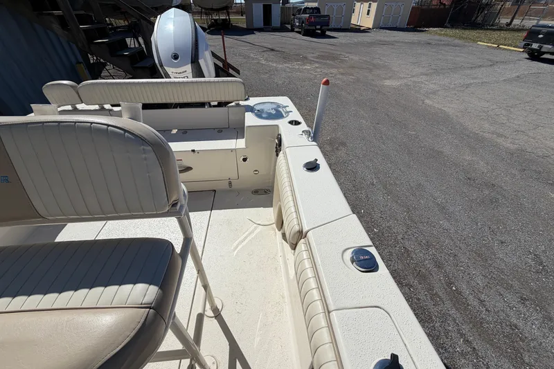 Slide: The Image of 2017 Sea Chaser 24 HFC boat interior with seating and motor view. - 49