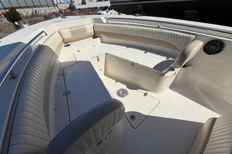 Slide: The Image of 2017 Sea Chaser 24 HFC boat interior with cushioned seating and storage compartments. - 57