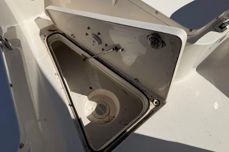 Slide: The Image of Open storage compartment on a 2017 Sea Chaser 24 HFC boat. - 64
