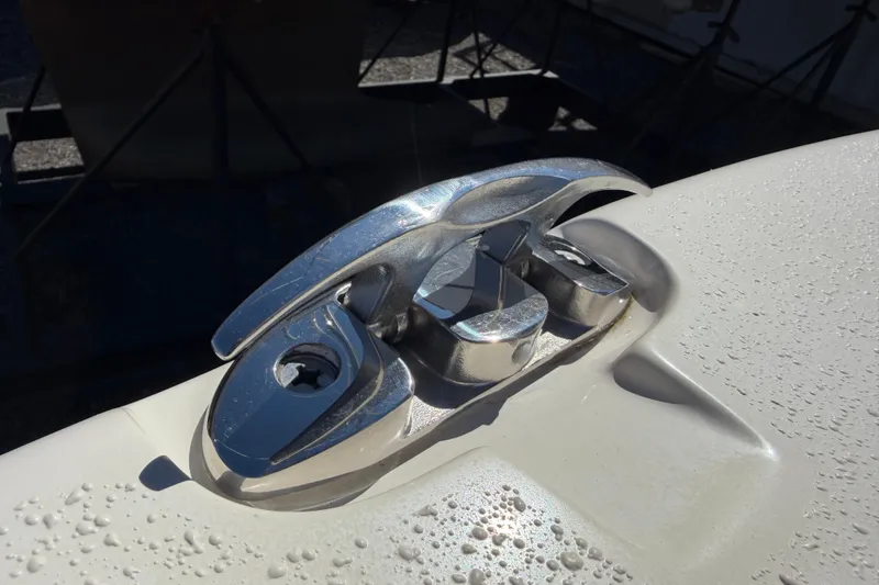 Slide: The Image of Chrome cleat on 2017 Sea Chaser 24 HFC boat, with water droplets. - 70