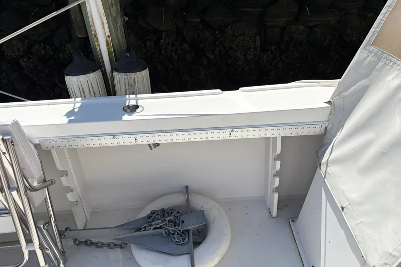 Slide: The Image of 2005 Steiger Craft 23 Miami boat deck with anchor and measuring ruler. - 21