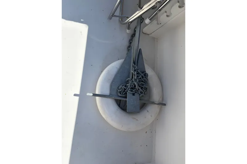 Slide: The Image of Anchor and chain on 2005 Steiger Craft 23 Miami boat deck. - 9