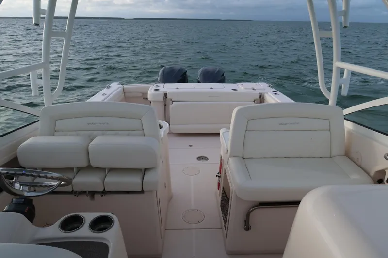 Slide: The Image of 2018 Grady-White Freedom 307 boat interior with ocean view. - 30