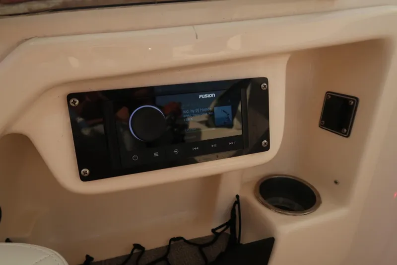Slide: The Image of Fusion stereo system on 2018 Grady-White Freedom 307 boat dashboard. - 41