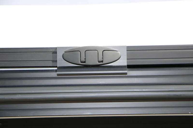 Slide: The Image of Close-up of Evotti 725 CS Tri-Toon 2026 boat component, featuring sleek black metal design. - 12