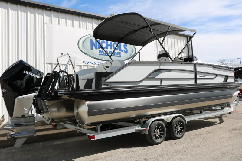Slide: The Image of 2026 Evotti 725 CS Tri-Toon boat on trailer, displayed at Nichols Marine. - 15