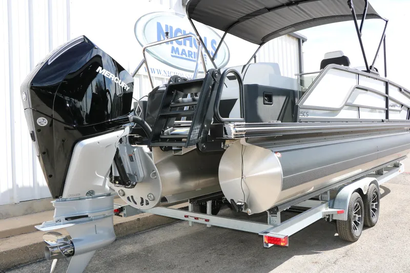 Slide: The Image of 2026 Evotti 725 CS Tri-Toon boat with Mercury engine on trailer. - 20